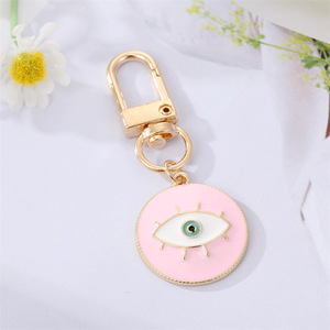 Venta al por mayor esmalte <span class=keywords><strong>mal</strong></span> de ojo llavero mujer buena suerte maldición auricular caja colgante - Product Image 2