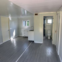 Maison conteneur extensible de 20 pieds - Maison modulaire préfabriquée avec cuisine et salle de bain complètes, prête à l'emploi pour dortoirs, complexes hôteliers et gîtes.