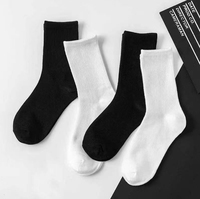 Chaussettes jetables tendance de couleur unie pour la course à pied Chaussettes respirantes en coton absorbant la sueur Chaussettes courtes de voyage
