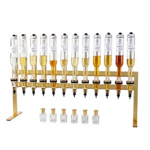 Dispensador de Perfume Moderno de 12 Botellas Plateadas para Hoteles de Lujo, Salones y Discotecas - Product Image 1