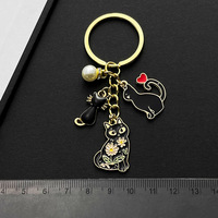 Porte-clés chat noir émaillé style dessin animé avec perle et cœur, pendentif de sac en métal – Grande Vente