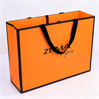 Sacs en papier orange de haute qualité pour vêtements, avec ruban gros-grain imprimé, logo personnalisé, taille et couleur sur mesure, grande capacité, emballage cadeau