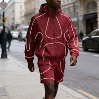 Ensemble de survêtement OEM de haute qualité en nylon résistant à l'eau avec short, logo personnalisé, bordure réfléchissante, coupe-vent et pantalon de survêtement pour homme