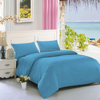 Tissu textile de maison en polyester 100 teint uni en cire véritable Tissu de drap de lit en microfibre de polyester d'hôtel Changxing pour drap plat