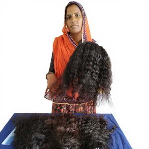 Venta al por mayor de cabello Remy virgen indio 100% natural sin procesar, largo, negro y rizado, con doble trama y encaje frontal, 100g, libre de piojos. - Product Image 1