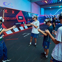Realidad virtual 9D Shooting Game Simulator Vr Free Roaming Arcade Arena para multijugador con Big Space Theme Park