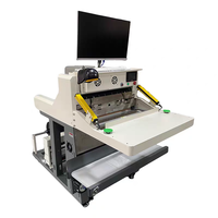 Machine d'emballage automatique pour sacs tubulaires de distribution e-commerce, avec ensachage, impression, étiquetage et conditionnement