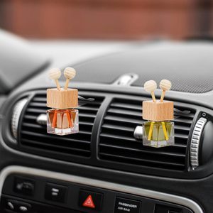 Ambientador de aire de botella de Perfume de coche superventas de 8ml, difusor de Perfume de coche transparente, botella vacía con tapa de madera negra y <span class=keywords><strong>Clip</strong></span> de ventilación - Product Image 1