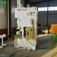 Machine automatique de formage de panneaux d'étagères, machine de fabrication de panneaux de rayonnages en acier pour la production en ligne de stockage en entrepôt