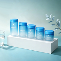 Vente en gros de flacons en verre givré bleu mat, flacons ronds vides pour capsules, flacons à pilules, impression personnalisée, contenants en verre pour les soins de santé