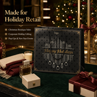 Sac cadeau en papier noir personnalisé pour Noël avec poignées en corde et impression UV sélective pour l'emballage de cadeaux de Noël en vente au détail