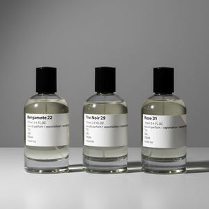 Botella de Perfume de Vidrio Vacía Personalizada, con Cierre a Presión, 30ml 50ml 100ml, Transparente, Redonda, con Pulverizador - Product Image 1