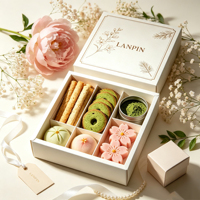 Boîte cadeau carrée rigide en carton avec insert à compartiments, impression florale et motifs graphiques pour l'emballage de pâtisseries, snacks, desserts et aliments