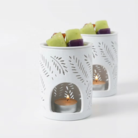 Brûleur d'huiles essentielles en céramique blanche moderne, design de fleur creuse, porte-bougie chauffe-plat en porcelaine, diffuseur d'arômes pour la décoration de la maison