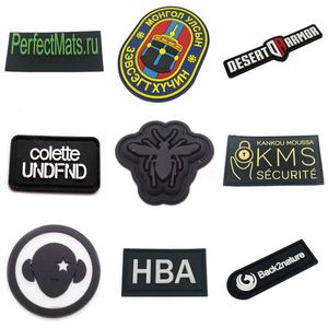 Écusson en silicone 3D personnalisé avec logo de marque en relief et couleurs vives pour manteau/veste - Product Image 1
