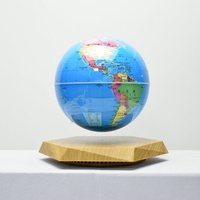 Globe Lumineux Flottant Créatif d'Art Moderne en Gros, Ornement de Nuit avec Base Polygonale Jaune en ABS et Lévitation Magnétique