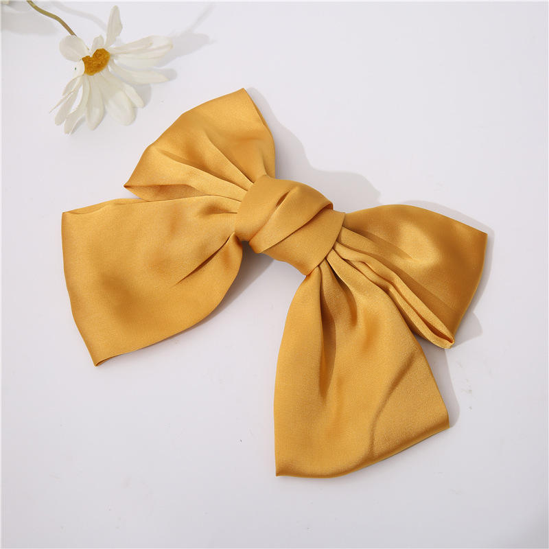 Yellow bow hair clip