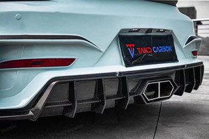 ชุดตัวถังคาร์บอนไฟเบอร์สไตล์ใหม่สำหรับ Porsche 718 Cayman 982พร้อมด้วยสปอยเลอร์กันชนหน้าและกระโปรงข้างที่ได้รับการอัพเกรด - Product Image 3