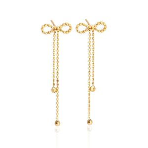 Xinfly Simple Fashion Bow Tassel Earrings 18K Gold Lace Plain AU750 Earrings for Women for Parties and Trendy Style - Product Image 1