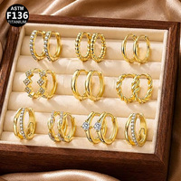 Boucles d'oreilles créoles clicker Huggie personnalisées en titane de qualité implantable ASTM F136 Gaby Jewelry
