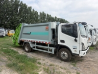 Camion compacteur de déchets municipaux 4x2 à système hydraulique silencieux avec élévateur de conteneurs à commande automatique