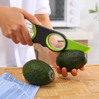 Gadget de cuisine multifonctionnel : Coupe-avocat en plastique, couteau à dénoyaouter et outil de découpe pour fruits et légumes