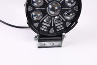 Lumière LED circulaire durable à lentille mixte pour la conduite de moto urbaine et suburbanite de nuit et l'aventure