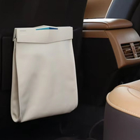 Poubelle de voiture suspendue de luxe de haute qualité, mini poubelle pour siège arrière de voiture, accessoires en cuir pour l'intérieur