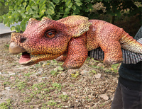 Marionnette de dinosaure personnalisée pour enfants, idéale pour les spectacles en plein air, sûre et lumineuse pour les aires de jeux et les théâtres de marionnettes.