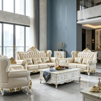 Europäisches Klassisches Goldgeschnitztes Ledersofa-Set Luxus-Villa Wohnzimmer Massivholzrahmen Couch Wohnmöbel