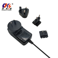 Adaptateur d'alimentation CC de style nouveau avec prises interchangeables US+UK+EU+AU pour routeur, bande LED, lampe, CCTV, tension de sortie 12V