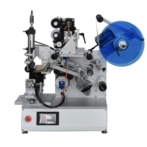 Machine d'étiquetage - Étiquetage avec marques déposées - Autocollant de petite taille - Product Image 1