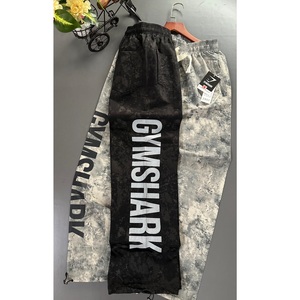 Camiseta de punto con estampado Tie-Dye importada de Gym Shark, calidad de exportación, para hombre, ropa deportiva informal a la moda, cómoda y moderna. - Product Image 1