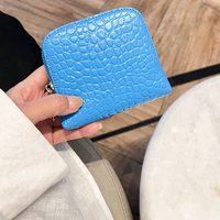 Boîte à bijoux de voyage en cuir gaufré crocodile avec fermeture éclair et pochette accordéon pour bagues et boucles d'oreilles