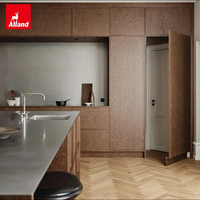 Armoire de cuisine Alland Nordic Atmosphere Clean Lines en acier inoxydable avec plan de travail en placage de noyer noir pour maison de ville d'architecte
