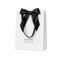 Sac en papier blanc de luxe avec logo personnalisé, ruban en satin noir, emballage cadeau pour boutique, sac de shopping pour mariage ou fête