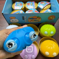 Jouet anti-stress souple en PU en forme de boulette vapeur aux grands yeux arc-en-ciel, jouet à presser pour enfants, cadeau de fête ou farce