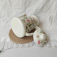 Vente en gros de luxe 1,2 L Cafetière en émail à motif personnalisé Bouilloire en fonte pour l'eau chaude pour la maison Camping en plein air