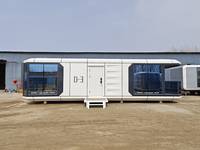 Maison modulaire extensible imperméable entièrement finie, cabane préfabriquée mobile, porte de sécurité en acier, panneaux en laine de roche