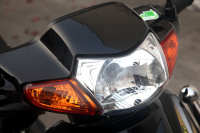 Moto à châssis ouvert 125cc à faible consommation de carburant pour les trajets quotidiens et le transport de marchandises en Asie du Sud-Est et en Afrique