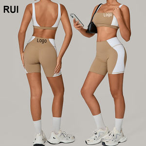 RUIQUWIN Vêtements de sport personnalisés pour femmes Soutien-gorge de yoga dos nu à maintien élevé Short d'entraînement Patchwork sans couture Ensemble de yoga 2 pièces OEM - Product Image 1