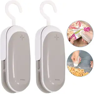 Sellador de bolsas de calor de mano Mini sellador de bolsas de plástico inteligente para almacenamiento de alimentos hermético resella bolsas de aperitivos sellado térmico herramientas de cocina