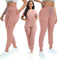 Cintre élégant à boucle d'épaule costumes de gommage médicaux femmes hommes ensemble d'allaitement Logo personnalisé col en V pantalon de survêtement uniformes d'hôpital