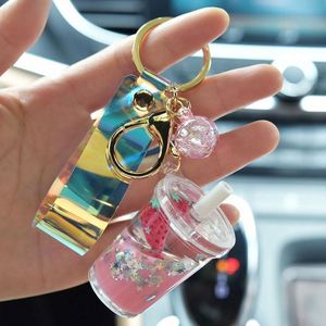 Factory Wholesale <b>Cute</b> Unicorn Bottle Keyholder Floating Keychain with Milk Tea Liquid Made of Zinc Alloy Plastic for <b>Keyring</b> - Product Image 2