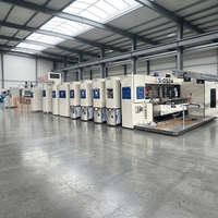 Machine automatique de fabrication de boîtes en carton ondulé à grande vitesse avec plieuse-colleuse flexo et cerclage automatique