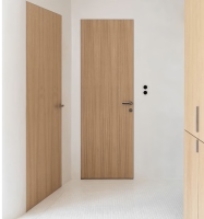 Porte coulissante invisible en bois massif 2026, style minimaliste, murale dissimulée pour chambres d'hôtel, appartements et espaces intérieurs