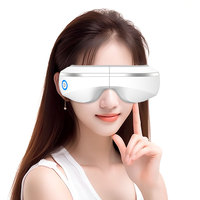 Intelligenter vibrierender Augenmassagegerät mit Bluetooth-Funktion, Luftdruck-Kompression, 180° faltbar, kabellose Fernbedienung – tragbar