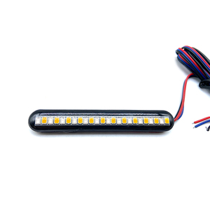 ไฟเลี้ยว LED แบบไดนามิกสำหรับมอเตอร์ไซค์ ADT พร้อมไฟส่องป้ายทะเบียนสีแดงอำพัน - Product Image 1
