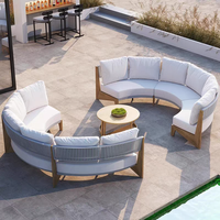 Ensemble canapé rond moderne pour l'extérieur Table basse en U avec coussins gris Matériau en bois de teck pour l'extérieur