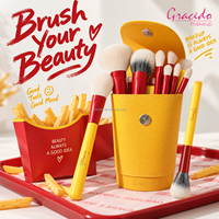 Ensemble de pinceaux de maquillage professionnel Gracedo 10 pièces, étui cylindrique en cuir jaune, poignée rouge, pinceau à raser, pinceau pour fond de teint et poudre